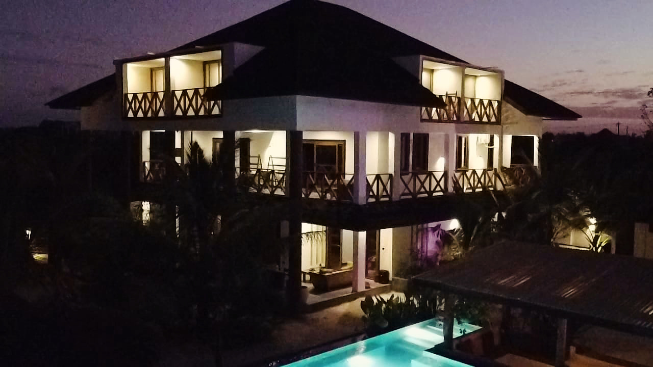 Baobab Bungalows villa at dusk from above